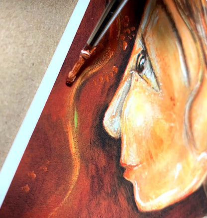 Artistic depiction of a woman holding a child with a decorative background, mother and daughter hugging artwork, painting of mom and little girl, forgiveness artwork, paintings of forgiving, hopeful optimistic gold and red artwork for moms and women, kmberggren, km berggren, kimberggren