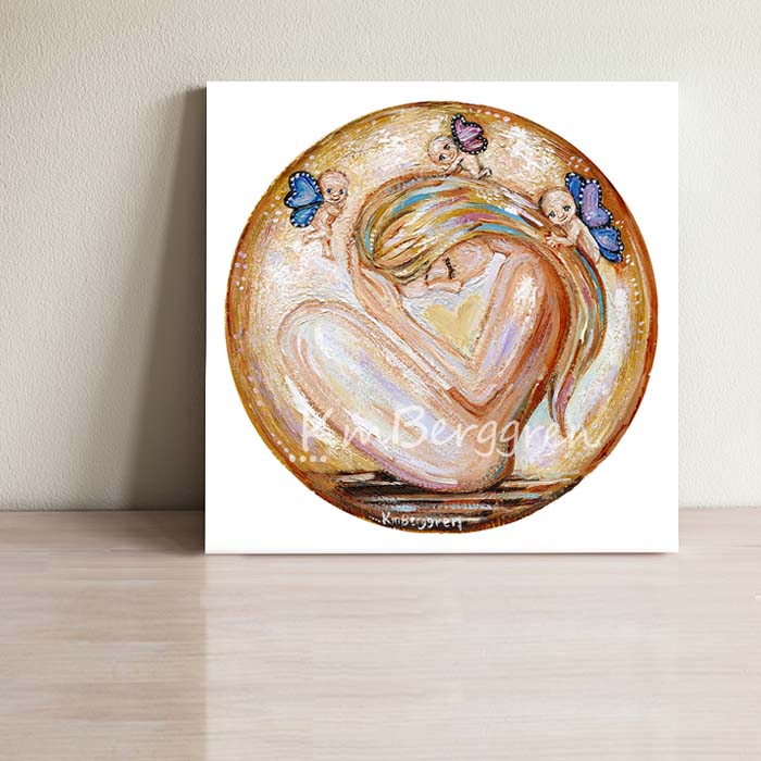 blonde mother, gold artwork of grieving mom with 3 bald naked angel winged babies hovering over her, connected with mommy, circle artwork gold with jewel tones by kmberggren