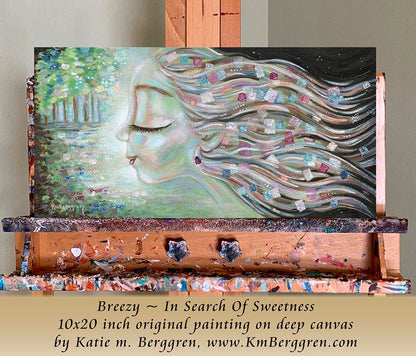Artistic depiction of a face with flowing hair on a wooden easel against a plain wall. Artistic depiction of a woman with flowing hair and colorful flowers, with text overlay. original artwork by kmberggren, woman's profile painting, woman in forest, meditation artwork, soothing calm painting of women