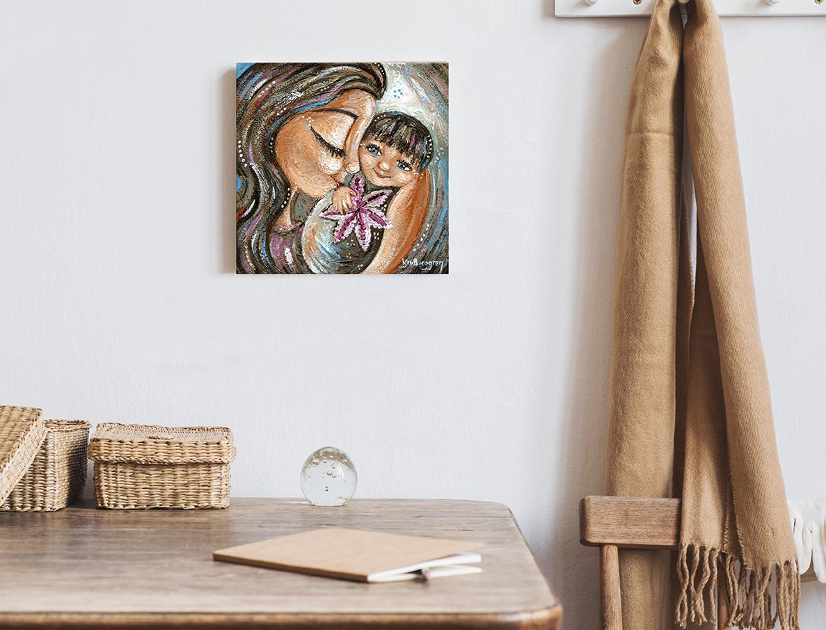brunette mother and blue eyed brunette child. smiling baby with lily flower. stargazer lily. mother baby artwork by Katie m. Berggren, unique mothers day gifts