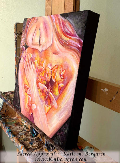 painting of woman with butterflies in her heart, self love artwork, painting of woman with pink hair, pink and yellow butterflies, orange butterfly artwork, painting of self love, painting for strong woman, self-healing artwork, art therapy for women, original painting by kmberggren