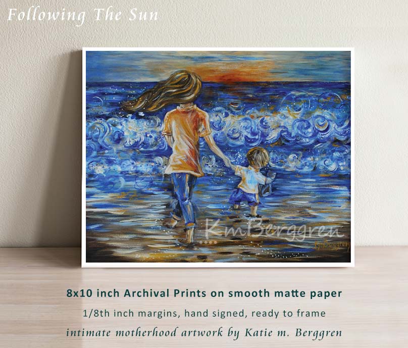 mother walking towards the sun and towards the water on the beach holding hands with a little boy, sunset on the beach art by KmBerggren