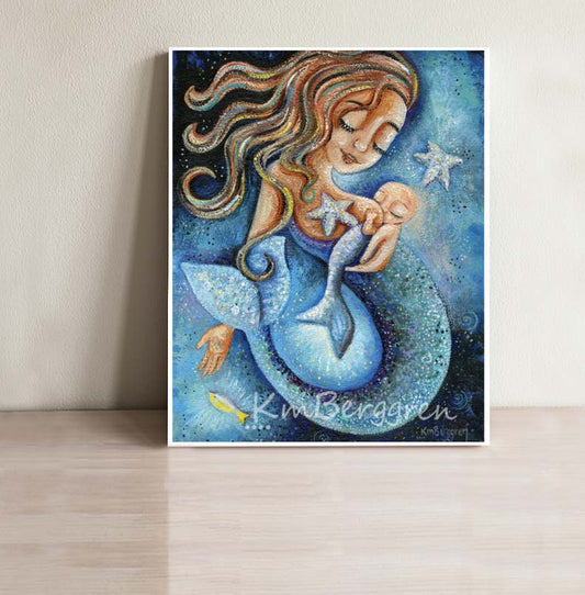 breastfeeding mermaid with bald infant at breast, blue water, starfish and red long way hair artwork