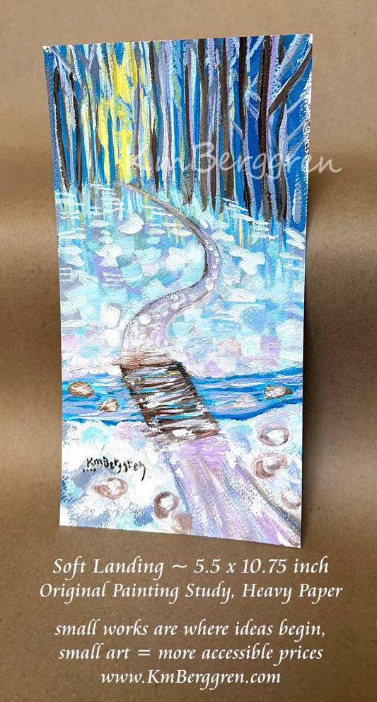 An original painting study titled 'Soft Landing' by artist KmBergren, depicting a blue and white snowy landscape with a wooden bridge on a lavendar path. The artwork is created on textured heavy paper, kimberggren, katie m berggren artwork to inspire women