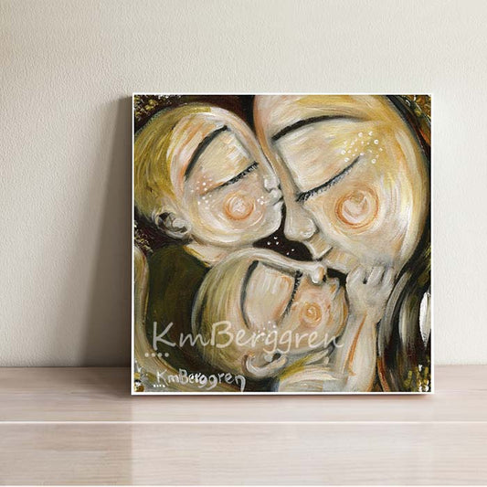 yellow art print of mama kissing the faces of two babies