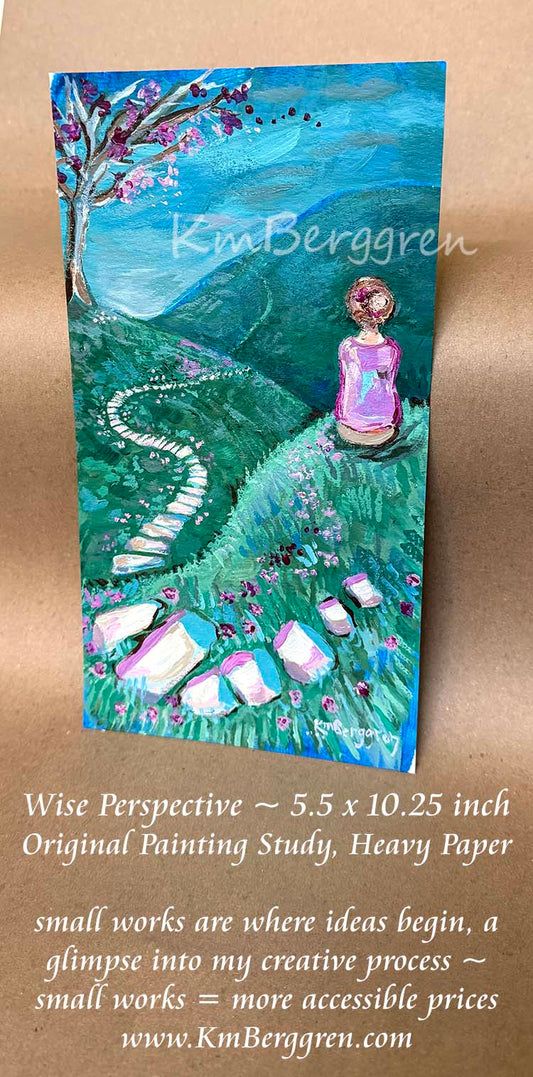 A vertical painting on heavy paper showing a woman in a pink shirt sitting on a grassy hill near a tree with pink blossoms, with a winding path leading up the hill and away into the future over rolling hills with green grass toward a blue sky. Text below describes the artwork as 'Wise Perspective' by KmBerggren. Artwork by Katie m Berggren, kimberggren