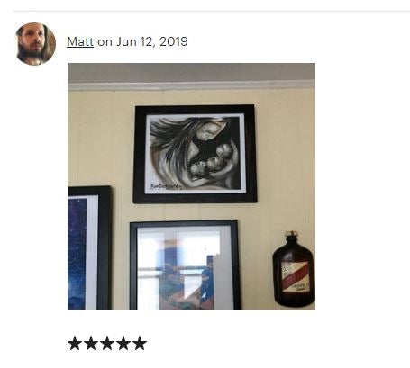 framed art prints by KmBerggren on a doctor's wall