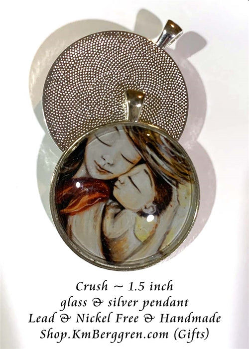 silver or bronze glass art pendant 1.5 inches across handmade by the artist