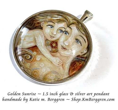 silver glass art pendant of Golden Sunrise handmade by Katie m. Berggren