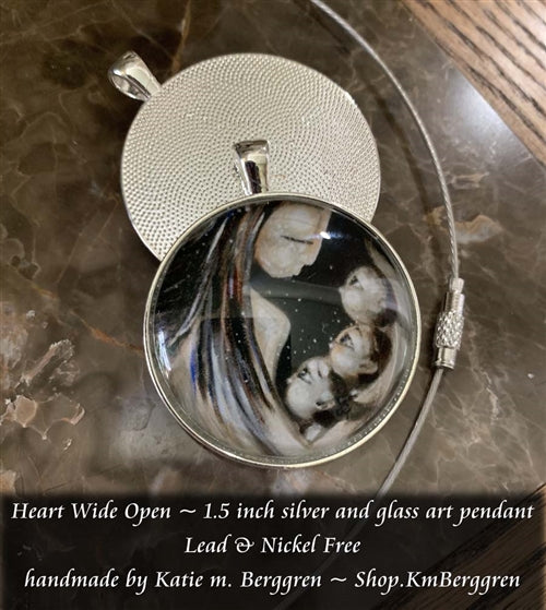 silver and glass art pendant of dark haired mother with three children handmade by Katie m. Berggren