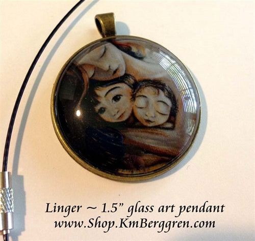 glass art pendant of mother with two children 1.5 inches across handmade by the artist